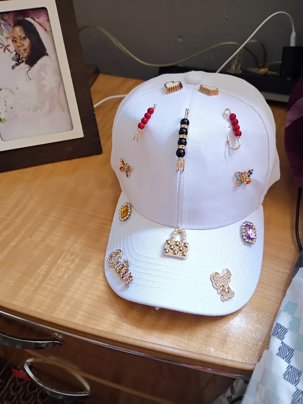 Embellished White Baseball Cap with Gem & Charm Accents